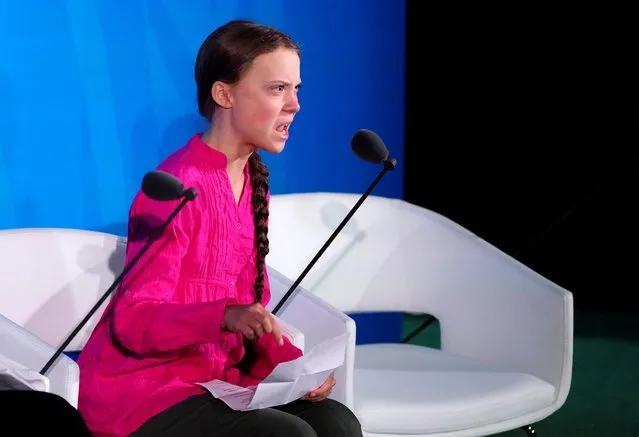Sixteen-year-old Swedish climate activist Greta Thunberg speaks at the United Nations Climate Action Summit at U.N. headquarters in New York City, September 23, 2019. “You have stolen my dreams and my childhood with your empty words”, Thunberg said at a U.N. climate change summit, admonishing adults for not doing enough to protect the environment. (Photo by Carlo Allegri/Reuters)