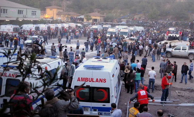 Medics, family members and friends wait outside a hospital hours after an explosion and fire at a coal mine killed at least 17 miners and left up to 300 workers trapped underground, in Soma, in western Turkey, Tuesday, May 13, 2014, a Turkish official said. Twenty people were rescued from the mine but one later died in the hospital, Soma administrator Mehmet Bahattin Atci told reporters. The town is 250 kilometers (155 miles) south of Istanbul. The death toll was expected to rise.(Photo by AP Photo/Depo Photos)