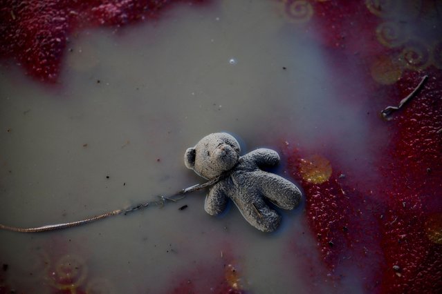 A soft toy is seen at the site where believers had gathered for a Hindu religious congregation, following which a stampede occurred, in Hathras district of the northern state of Uttar Pradesh, India, on July 3, 2024. (Photo by Anushree Fadnavis/Reuters)