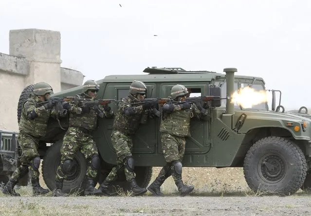 Romanian soldiers take part in a joint military exercise with NATO members, called “Agile Spirit 2015” at the Vaziani military base outside Tbilisi, Georgia, July 21, 2015. (Photo by David Mdzinarishvili/Reuters)