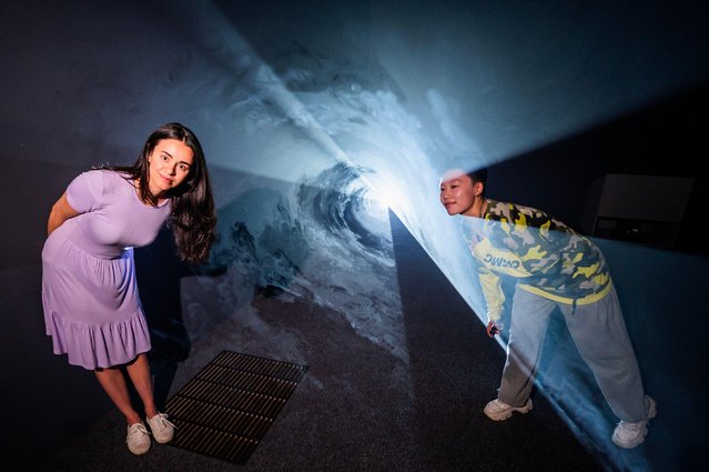 Solid Light, an exhibition of the immersive works of Anthony McCall, opens at Tate Modern in London on June 25, 2024. Installations use beams of light projected through a thin mist to create large three-dimensional forms. (Photo by Guy Bell/Alamy Live News)