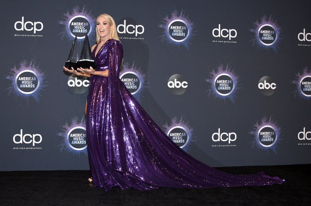 Singer Carrie Underwood poses in the press room at the 2019 American Music Awards at Microsoft Theater on November 24, 2019 in Los Angeles, California. (Photo by Stewart Cook/Rex Features/Shutterstock)