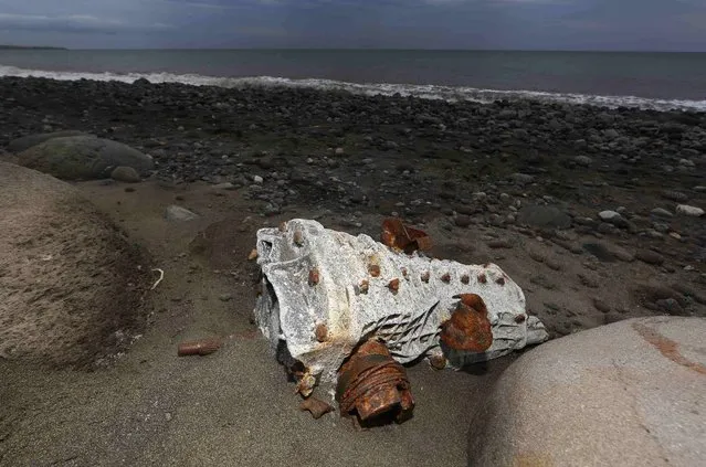 Debris that has washed onto the Jamaique beach in Saint-Denis is seen on the shoreline of French Indian Ocean island of La Reunion, August 3, 2015. (Photo by Jacky Naegelen/Reuters)