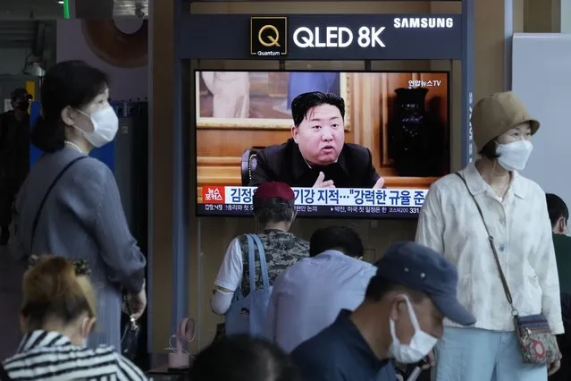 People watch a TV showing an image of North Korea leader Kim Jong Un during a news program at the Seoul Railway Station in Seoul, South Korea, Monday, June 13, 2022. Kim and his top deputies have pushed for a crackdown on officials who abuse their power and commit other “unsound and non-revolutionary acts”, state media reported Monday, as Kim seeks greater internal unity to overcome a COVID-19 outbreak and economic difficulties. (Photo by Ahn Young-joon/AP Photo)