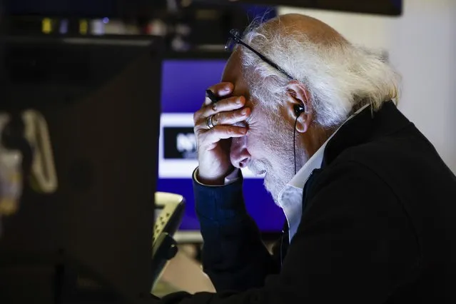 Trader Peter Tuchman reacts as he works on the floor at the New York Stock Exchange in New York, Monday, June 13, 2022. (Photo by Eduardo Munoz Alvarez/AP Photo)