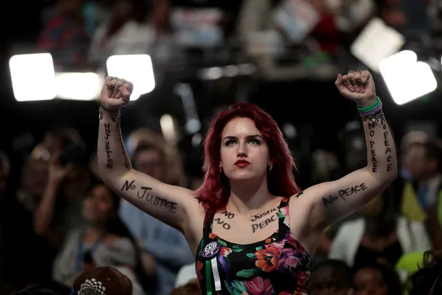 Olivia Love-Hatlestad of Grayslake, IL., stands during the second day of the Democratic National Convention at the Wells Fargo Center, July 26, 2016 in Philadelphia, Pennsylvania. An estimated 50,000 people are expected in Philadelphia, including hundreds of protesters and members of the media. The four-day Democratic National Convention kicked off July 25. (Photo by Drew Angerer/Getty Images)