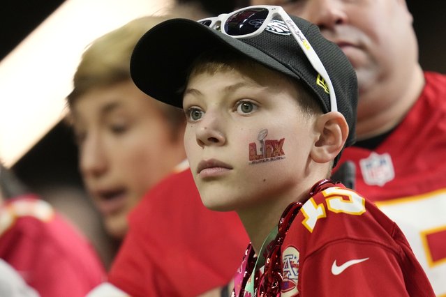 A Kansas City Chiefs fan watches prior to the NFL Super Bowl 59 football game between the Chiefs and the Philadelphia Eagles, Sunday, February 9, 2025, in New Orleans. (Photo by Ashley Landis/AP Photo)