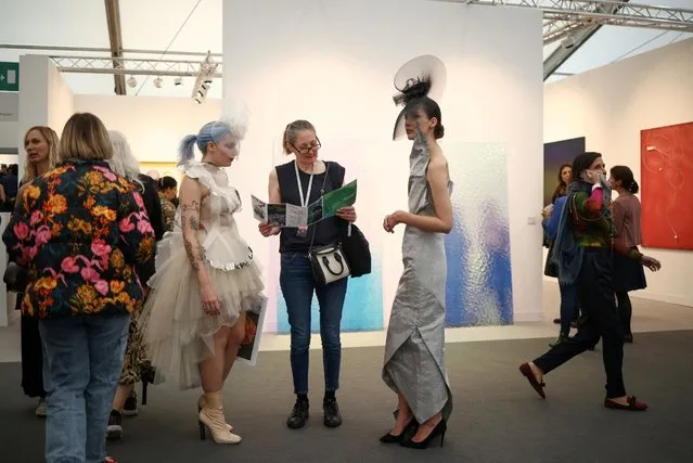 Visitors attend the annual Frieze London Art Fair in London, Britain on October 12, 2022. (Photo by Henry Nicholls/Reuters)