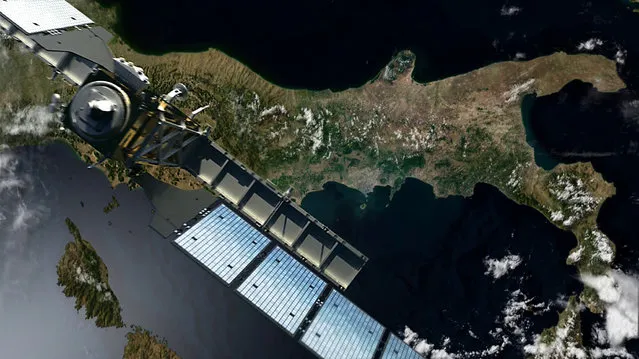An undated handout picture made available by the European Space Agency (ESA) on October 2, 2014 shows ESA's Sentinel-1 passing over the Italian peninsula, in space. Sentinel-1, a Synthetic Aperture Radar in C-band, carries an advanced radar instrument to provide an all-weather, day-and-night supply of continuous imagery of Earth's surface. (Photo by EPA/ESA)