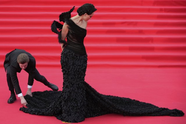 Russian actress Nastasya Samburskaya poses for photographers upon arrival at the opening ceremony of the 47th Moscow International Film Festival in Moscow, Russia, Thursday, April 24, 2025. (Photo by Pavel Bednyakov/AP Photo)