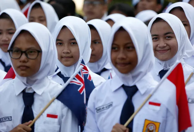 School children attend the welcoming ceremony for visiting New Zealand Prime Minister John Key at the presidential palace in Jakarta, Indonesia July 18, 2016. (Photo by Darren Whiteside/Reuters)