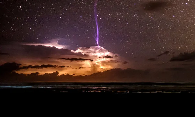 Sprite Lightning by Ben Cherry. “Taken while trying to photograph the milkyway and a pulsing lightning storm for off the coast of Costa Rica on the Pacific side. Midway through the 30 second exposure this shaft of light launched up into the atmosphere, this is called a sprite strike. It was the only one I saw and it was a very special experience”. (Photo by Ben Cherry/Weather Photographer of the Year 2016)