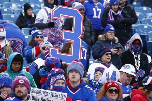 Fans show their support for Buffalo Bills safety Damar Hamlin prior to an NFL wild-card playoff football game between the Buffalo Bills and the Miami Dolphins, Sunday, January 15, 2023, in Orchard Park, N.Y. (Photo by Jeffrey T. Barnes/AP Photo)