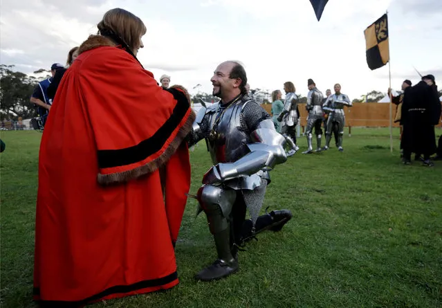 Australian jousting knight Cliff Marisma receives his champion's medallion from Ku Ring Gai Mayor Jennifer Anderson after the final round of the jousting competition the St Ives Medieval Fair in Sydney, one of the largest of its kind in Australia, September 25, 2016. (Photo by Jason Reed/Reuters)