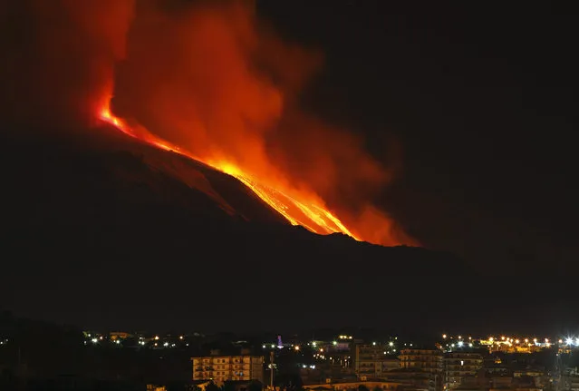 Mount Etna spews lava on the southern Italian island of Sicily on January 13, 2011. Mount Etna is Europe's tallest and most active volcano. (Photo by Antonio Parrinello/Reuters)
