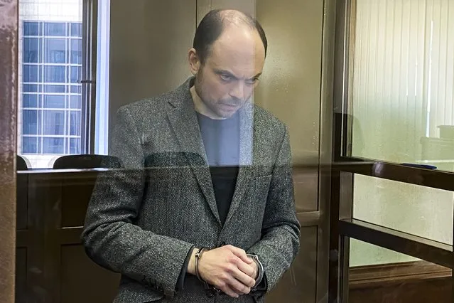 In this handout photo released by the Moscow City Court, Russian opposition activist Vladimir Kara-Murza stands in a class cage in a courtroom at the Moscow City Court in Moscow, on April 17, 2023. The 25-year treason sentence imposed on prominent Russian opposition figure Vladimir Kara-Murza on Monday was a particularly severe show of authorities' intensifying intolerance of criticism of the war in Ukraine and other dissenting opinions. (Photo by The Moscow City Court via AP Photo)