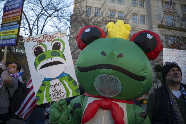 Demonstrators gather and held a rally around the White House to protest against US President Donald Trump in Washington, DC, on November 24, 2025. Protestors held hands in a long line and holding up a 'Crime Scene Do Not Cross' tape around the White House. (Photo by Celal Gunes/Anadolu via Getty Images)