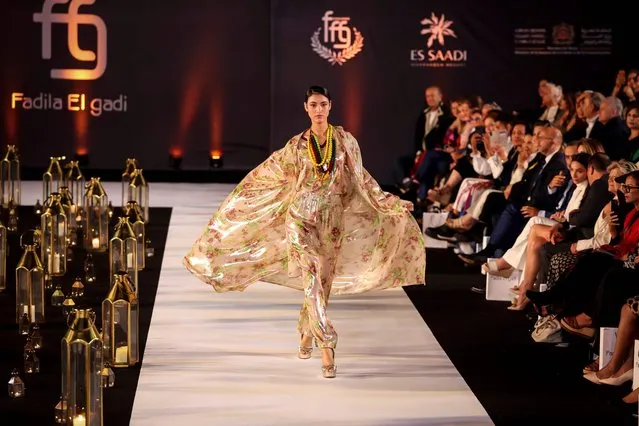 A model presents a creation by Moroccan designer Fadila El Gadi during a fashion show in Rabat on May 30, 2023. (Photo by Fadel Senna/AFP Photo)
