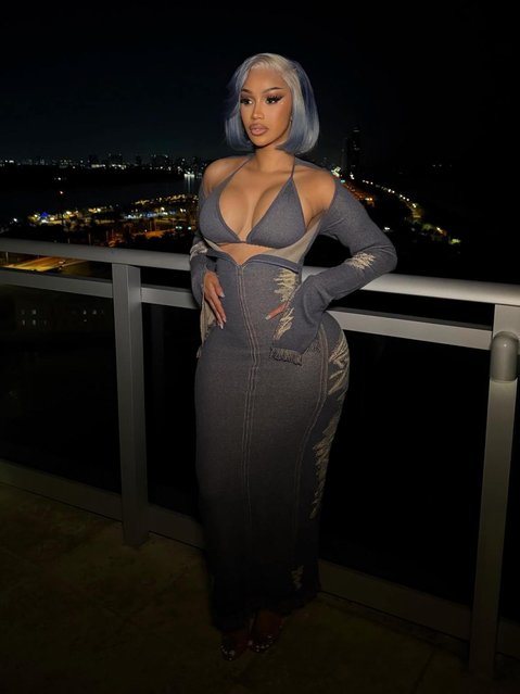 Rapper Cardi B matched her hair to her dress, tailored perfectly to her body, in Miami for Art Basel in the second decade of December 2025. (Photo by iamcardib/Instagram)
