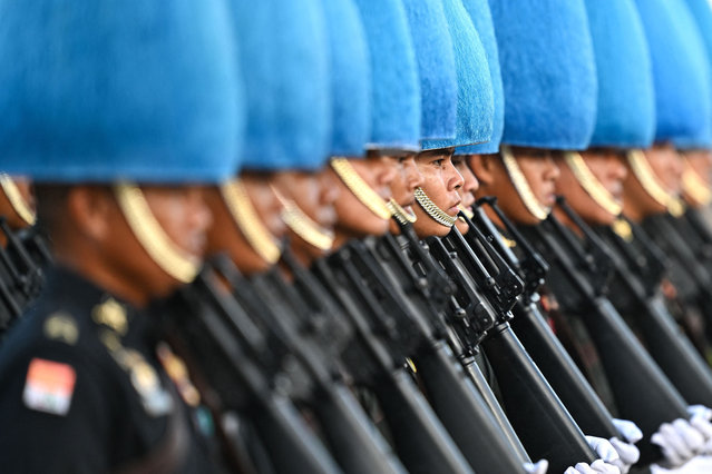 Thai Royal Guards take part in a rehearsal for “Trooping the Colour” and oath-giving ceremony to mark the 72nd birthday celebrations of Thailand's King Maha Vajiralongkorn at Dusit Palace in Bangkok on November 30, 2024. The December 3 ceremony is set to be the first “Trooping the Colour” parade and oath-giving in 16 years, and the first of such ceremonies to be held during the reign of Thailand's King Maha Vajiralongkorn. (Photo by Manan Vatsyayana/AFP Photo)
