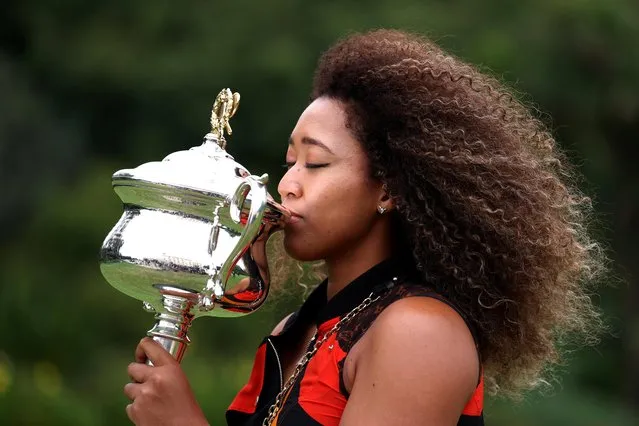 Naomi Osaka of Japan poses with the Daphne Akhurst Memorial Trophy after winning the 2021 Australian Open Women's Final, at Government House on February 21, 2021 in Melbourne, Australia. (Photo by Loren Elliott/Reuters)