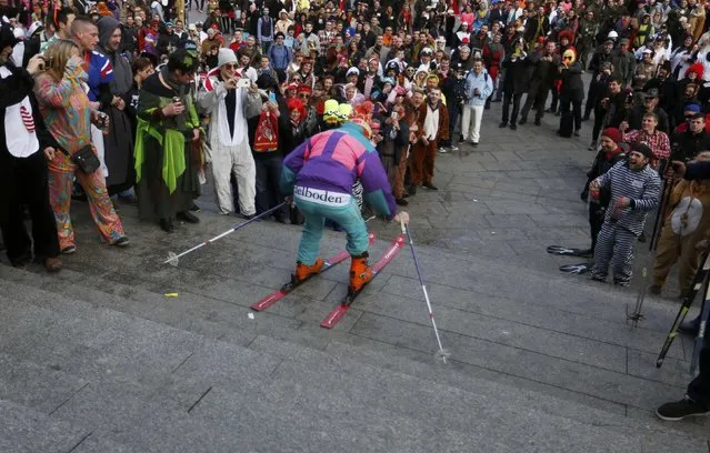A man skis down the stairs during “Weiberfastnacht” (Women's Carnival) in Cologne February 12, 2015. (Photo by Ina Fassbender/Reuters)