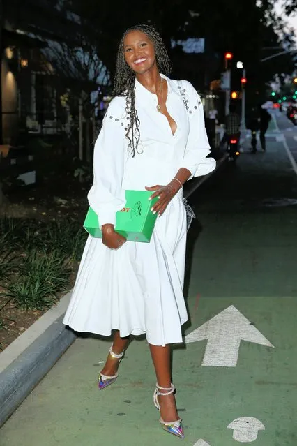 Somalian model Ubah Hassan wears a white dress with colorful high heels outside Watch What Happens Live in New York City in the first decade of September 2023. (Photo by Christopher Peterson/Splash News and Pictures)