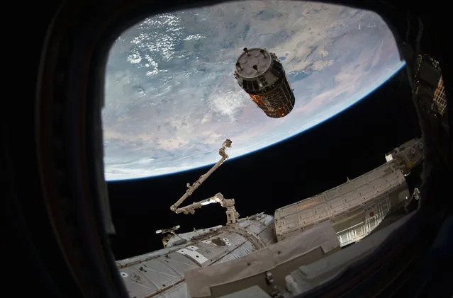 This photo provided by NASA TV shows a Japanese cargo ship before it arrives with Christmas gifts to the International Space Station on Tuesday, December 13, 2016. The capsule – called Kounotori, or white stork – contains nearly 5 tons of food, water, batteries and other supplies. NASA said there also are Christmas presents for the two Americans, three Russians and one Frenchman on board. (Photo by NASA TV via AP Photo)