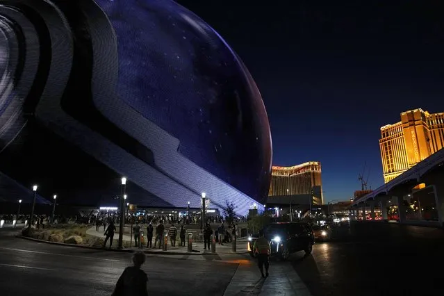 People arrive during the opening night of the Sphere, Friday, September 29, 2023, in Las Vegas. (Photo by John Locher/AP Photo)