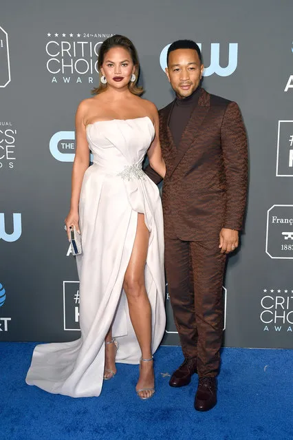 Chrissy Teigen (L) and John Legend attend the 24th annual Critics' Choice Awards at Barker Hangar on January 13, 2019 in Santa Monica, California. (Photo by Frazer Harrison/Getty Images)