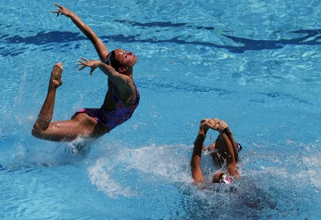 The team from Ukraine performs their Free Routine during the Synchronized Swimming Olympic Games Qualification Tournament at the Maria Lenk Aquatics Center in Rio de Janeiro, Brazil on March 6, 2016. (Photo by Sergio Moraes/Reuters)