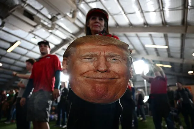 A supporter of former US President and 2024 presidential hopeful Donald Trump as he speaks at a Commit to Caucus Rally in Las Vegas, Nevada, on January 27, 2024. (Photo by Patrick T. Fallon/AFP Photo)
