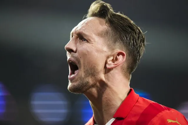 PSV's Luuk de Jong celebrates after scoring his side's first goal during the Champions League round of 16 first leg soccer match between PSV Eindhoven and Borussia Dortmund at Philips stadium in Eindhoven, Netherlands, Tuesday, February 20, 2024. (Photo by Peter Dejong/AP Photo)