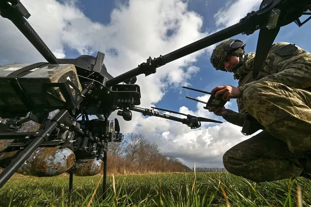 A Ukrainian serviceman checks a connection with an unmanned aerial vehicle near the front lines of the war with Russia on Friday, February 2, 2024. (Photo by Reuters/Stringer)