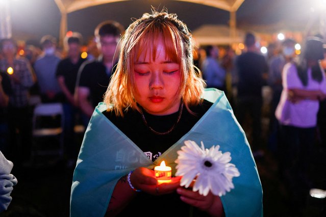 A person attends the commemoration of the 35th anniversary of the crackdown on pro-democracy demonstrators in Tiananmen Square in Beijing, in Taipei, Taiwan on June 4, 2024. (Photo by Ann Wang/Reuters)