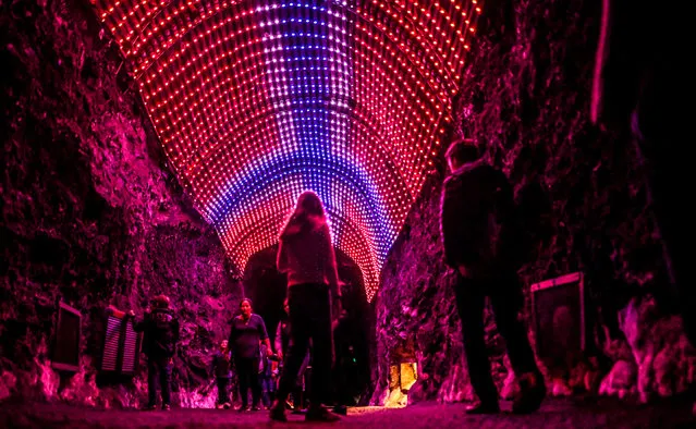 Tourists visit the Salt Cathedral of Zipaquira, an underground church built into a mine that produces salt, 45 km north of Bogota, on August 19, 2019. (Photo by Juan Barreto/AFP Photo)