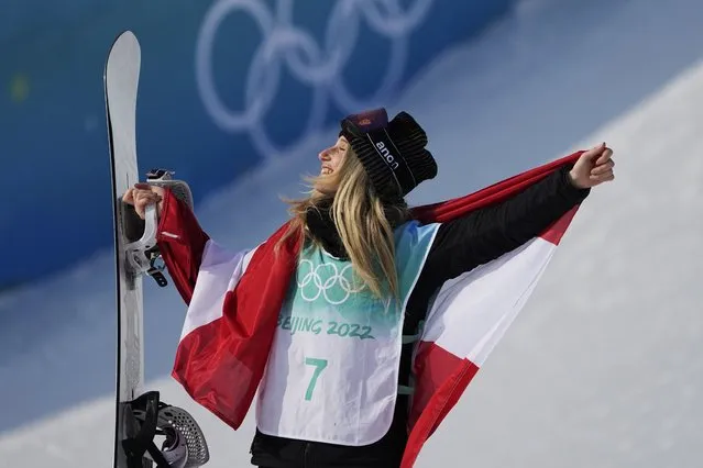 Gold medal winner Anna Gasser of Austria poses during a venue ceremony for the women's snowboard big air finals of the 2022 Winter Olympics, Tuesday, February 15, 2022, in Beijing. (Photo by Jae C. Hong/AP Photo)