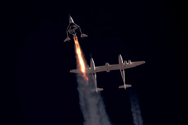 Virgin Galactic's passenger rocket plane VSS Unity, carrying Richard Branson and crew, begins its ascent to the edge of space above Spaceport America near Truth or Consequences, New Mexico, U.S. July 11, 2021 in a still image from video. (Photo by Virgin Galactic/Handout via Reuters)