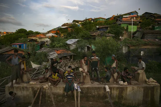 Rohingya laborers rest after working at a Rohingya refugee camp on August 22, 2019 in Cox's Bazar, Bangladesh. A fresh push to repatriate Rohingya refugees to Myanmar appeared August 22 to fall flat, with no Rohingya Muslims turning up to return to Myanmar. Myanmar's military crackdown on the ethnic Muslim minority forced over 700,000 to flee to Bangladesh from violence and torture. The United Nations has stated that it is a textbook example of ethnic cleansing. (Photo by Allison Joyce/Getty Images)