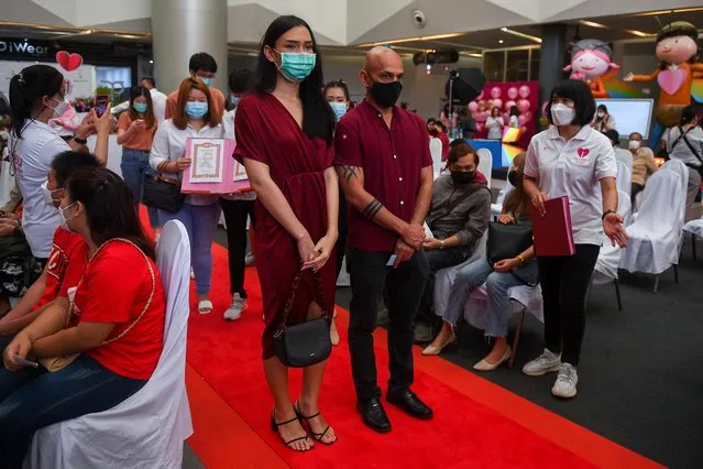 LBGTQ+ couples attend same-s*x marriage registration on Valentine's Day as a symbolic movement, as they will be presented with certificates recognising their relationships, but the certificates will not be legally binding in Bang Khun Thian district, Bangkok, Thailand, February 14, 2022. (Photo by Chalinee Thirasupa/Reuters)