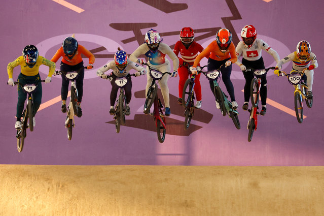 Athletes in action during heat 1 of the women's BMX semifinals run on August 2, 2024. (Photo by Gonzalo Fuentes/Reuters)