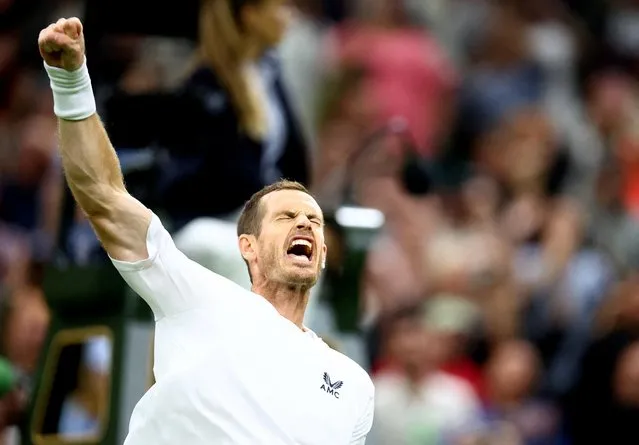 Britain's Andy Murray celebrates winning his first round match against Australia's James Duckworth, at All England Lawn Tennis and Croquet Club, London, Britain on June 27, 2022. (Photo by Hannah Mckay/Reuters)