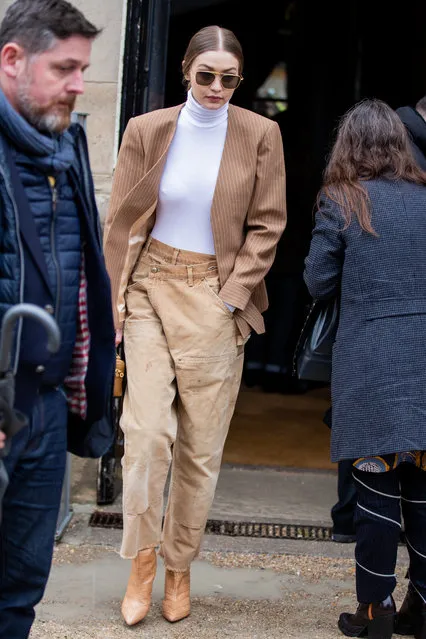 Gigi Hadid is seen wearing camel blazer and asymmetric pants outside Chloe during Paris Fashion Week Womenswear Fall/Winter 2020/2021: Day Four on February 27, 2020 in Paris, France. (Photo by Christian Vierig/GC Images)