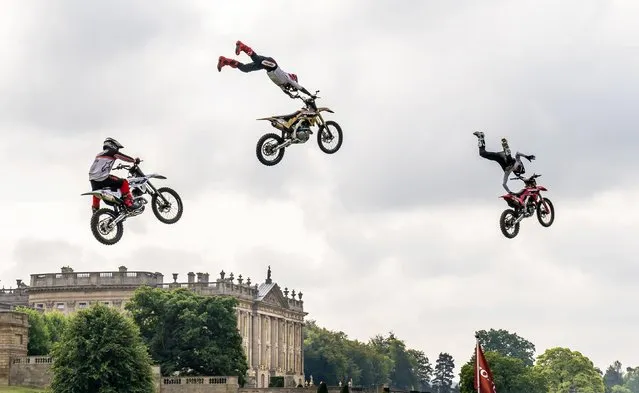 The Bolddog Lings FMX Display Team performs over Chatsworth House during the Chatsworth Country Fair in Bakewell, Derbyshire on Friday, September 2, 2022. (Photo by Danny Lawson/PA Images via Getty Images)