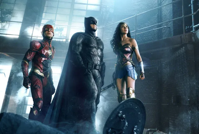 This image released by warner Bros. Pictures shows Ezra Miller, from left, Ben Affleck and Gal Gadot in a scene from “Justice League”. (Photo by AP Photos/Warner Bros Pictures)