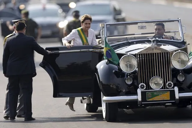 Brazil's President Dilma Rousseff gets into a vehicle during a civic-military parade to commemorate Brazil's Independence Day in Brasilia, Brazil September 7, 2015. (Photo by Ueslei Marcelino/Reuters)