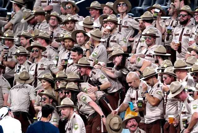 Fans dressed up as Sheriffs are seen during the ICC Men's T20 World Cup match between Australia and Ireland at The Gabba on October 31, 2022 in Brisbane, Australia. (Photo by Bradley Kanaris/Getty Images)