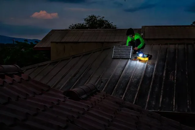 Adapting for Tomorrow. Solar Is The Key by Gaeus Lazar Tumlos Osilao. San Jose Del Monte Bulacan, The Philippines, April 2022. My neighbour Joe Ward started using a solar panel to decrease energy costs after the Covid-19 pandemic. (Photo by Gaeus Lazar Osilao/Environmental Photographer of the Year)