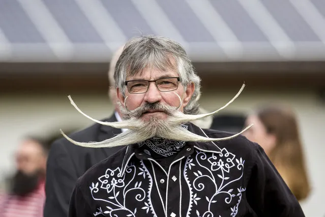 A contestant of the World Beard And Mustache Championships poses for a picture during the opening ceremony of the Championships 2015 on October 3, 2015 in Leogang, Austria. (Photo by Jan Hetfleisch/Getty Images)