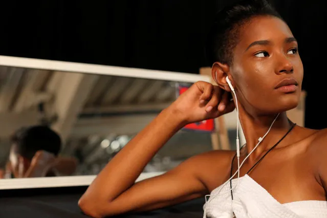 A model waits backstage before the Tommy Hilfiger Spring/Summer 2017 collection presentation at New York Fashion Week in Manhattan, New York, U.S., September 9, 2016. (Photo by Andrew Kelly/Reuters)